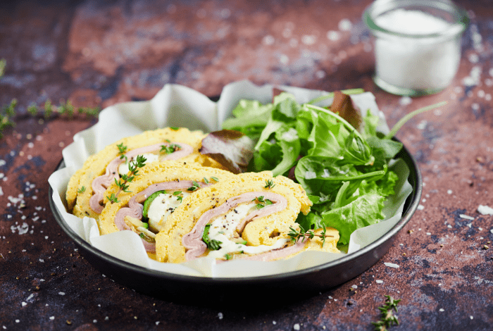 Omelette roll with zucchini and cooked ham